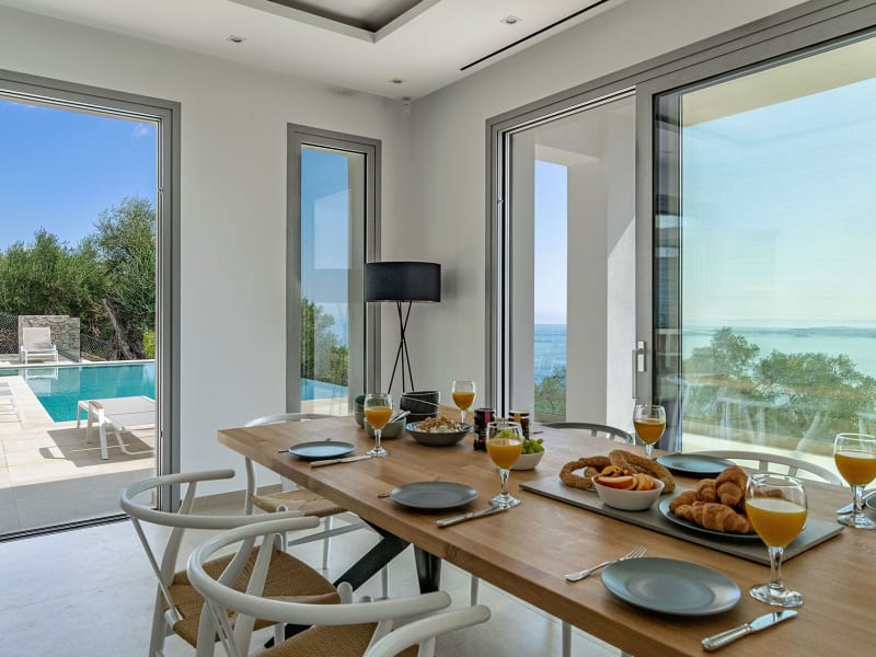 Views out to the sea and the pool from the dining area.