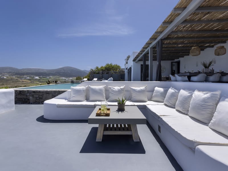 Back at the panoramic sea-view sitting area near the pool.