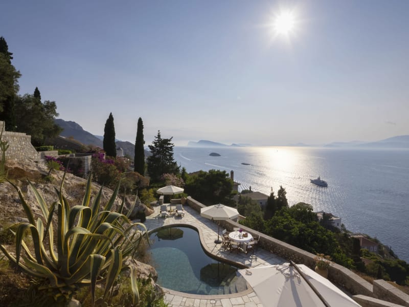 Views over the terraced gardens, the pool and the sea from the main house.