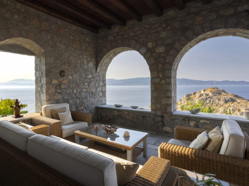 The sitting area on the main terrace with its graceful arches framing the views.