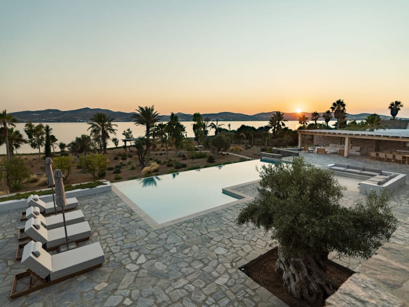 Time for one last swim in Saline's gorgeous infinity pool as the sun sets behind Antiparos.