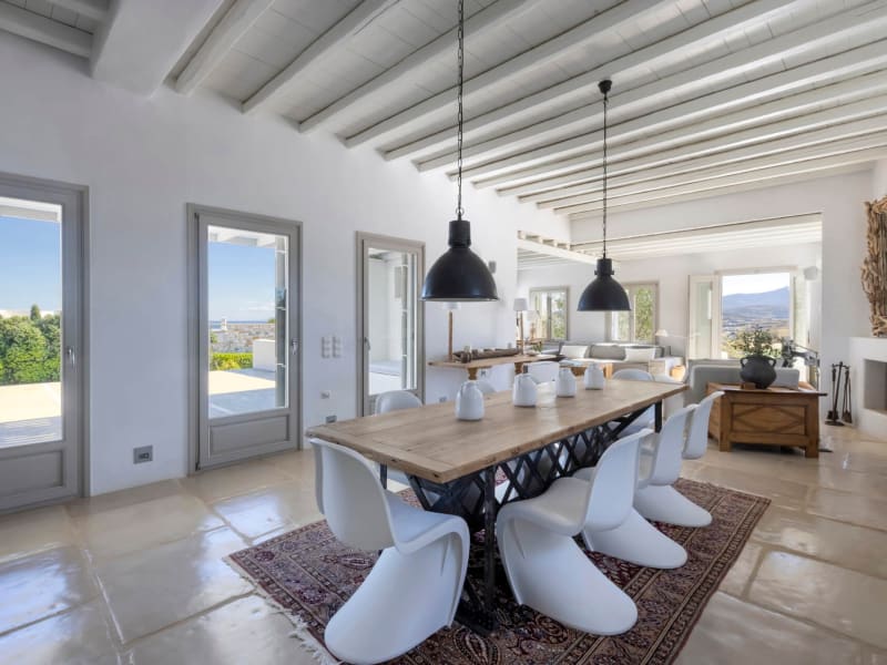 The spacious open-plan living and dining area on the ground floor of the main house.