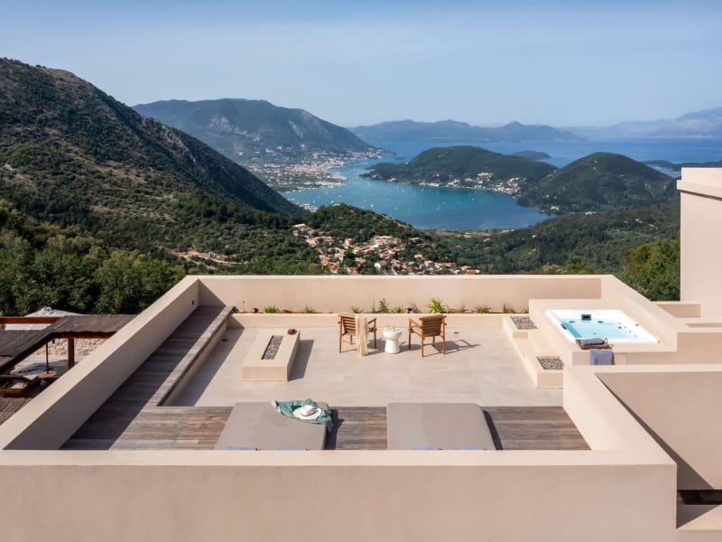 The rooftop terrace with its hydromassage tub and its Inspiring views out to Vlicho Bay and the island of Skorpios.