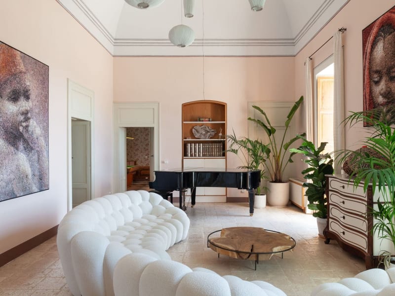 The first reception room on the piano nobile, a bright, airy, beautifully appointed space.
