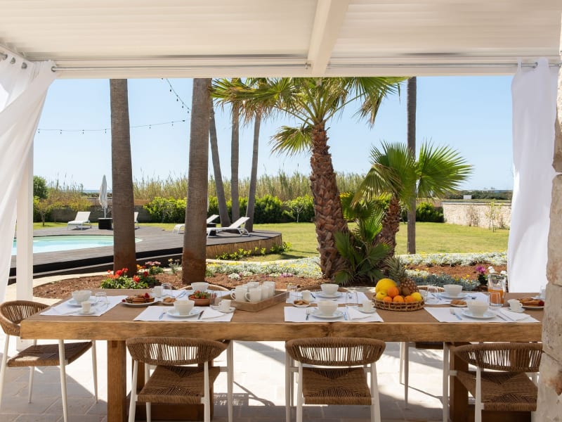Ready for breakfast at the shady al fresco dining area outside the kitchen.