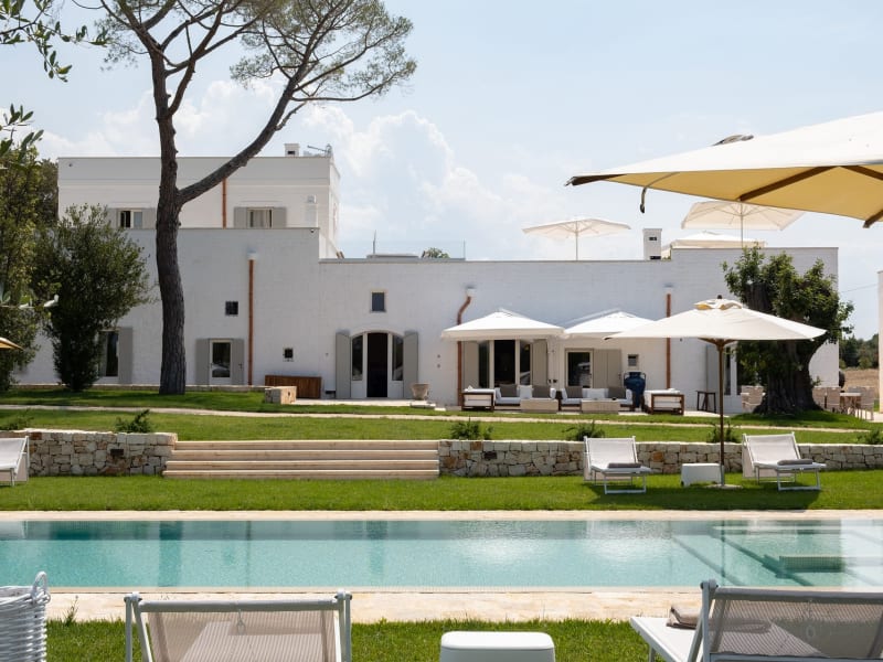 Verdant lawns, cerulean waters and the pristine white façade of Masseria Ciasca.