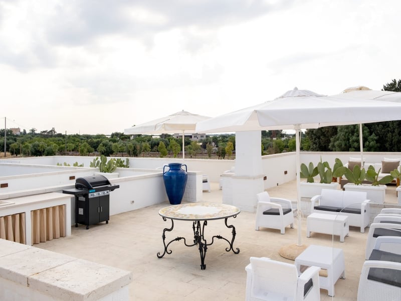 The fabulous roof terrace has lots of different areas, including a kitchen.