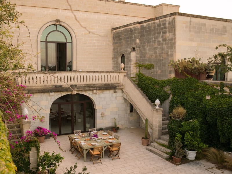 The east-facing side of the house with its secret sunken courtyard garden.