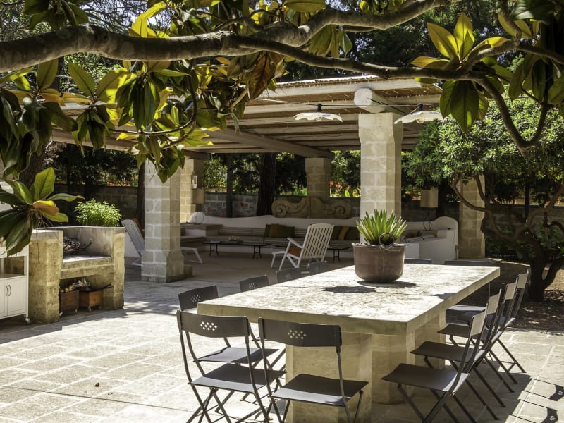 One of the al fresco dining areas is served by a barbecue.