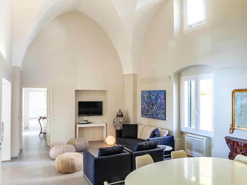 The open-plan living and dining area from the kitchen end.