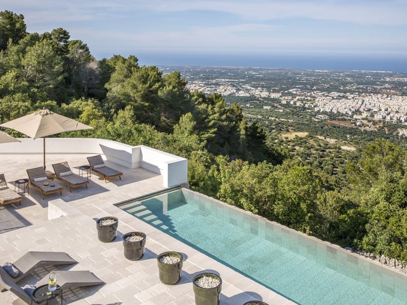 Olive groves, Fasano and the blue Adriatic Sea seen from the pool area.