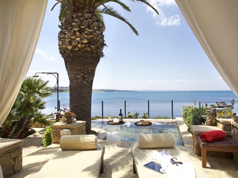 Azzurra's furnished sea-view terrace and plunge pool.