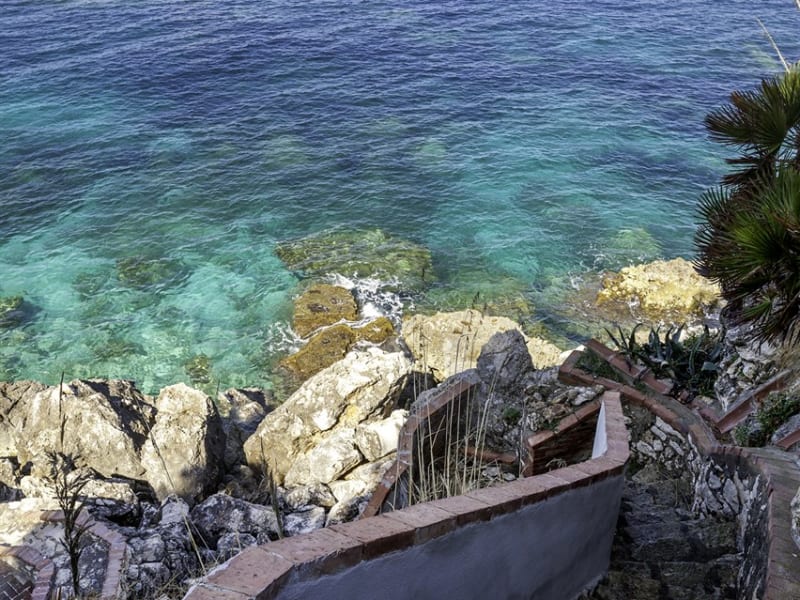 The steps down to the sea. 