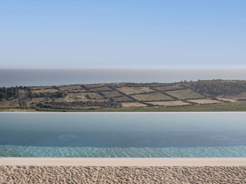 The glorious pool and the views out across Torre Salsa Nature Reserve to the sea.