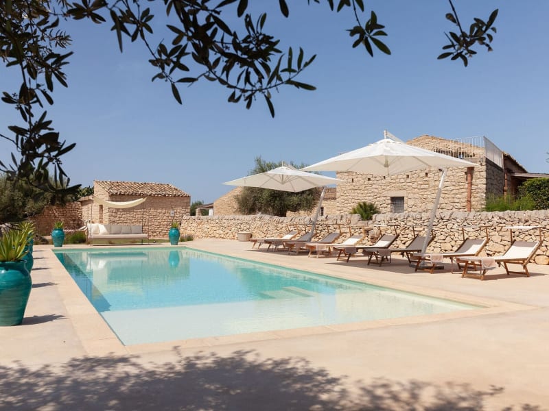 Masseria d'Estia rising above its gorgeous 15m-long pool.