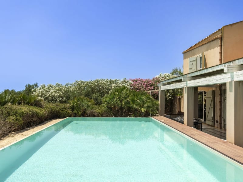The inviting pool and house.