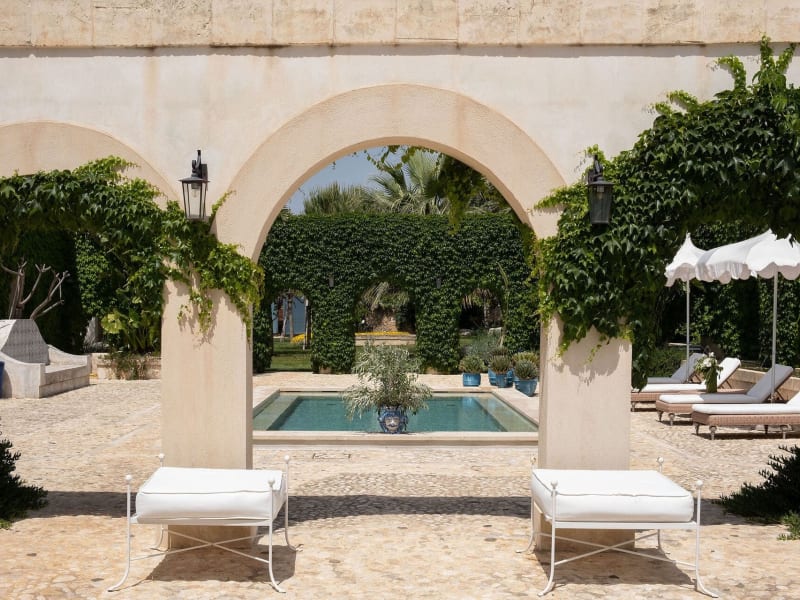 Elegant arches framing the second pool.