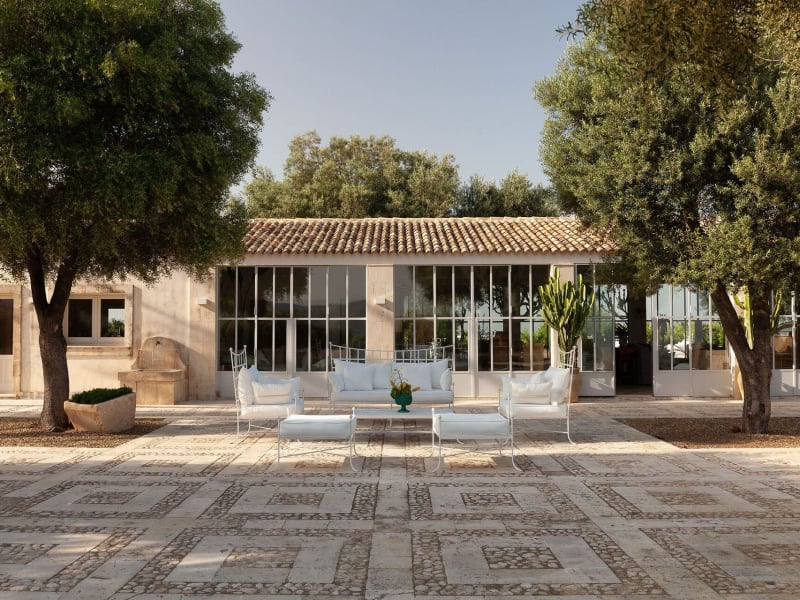 An elegant al fresco sitting area on one of the terraces outside the open-plan living and dining area.