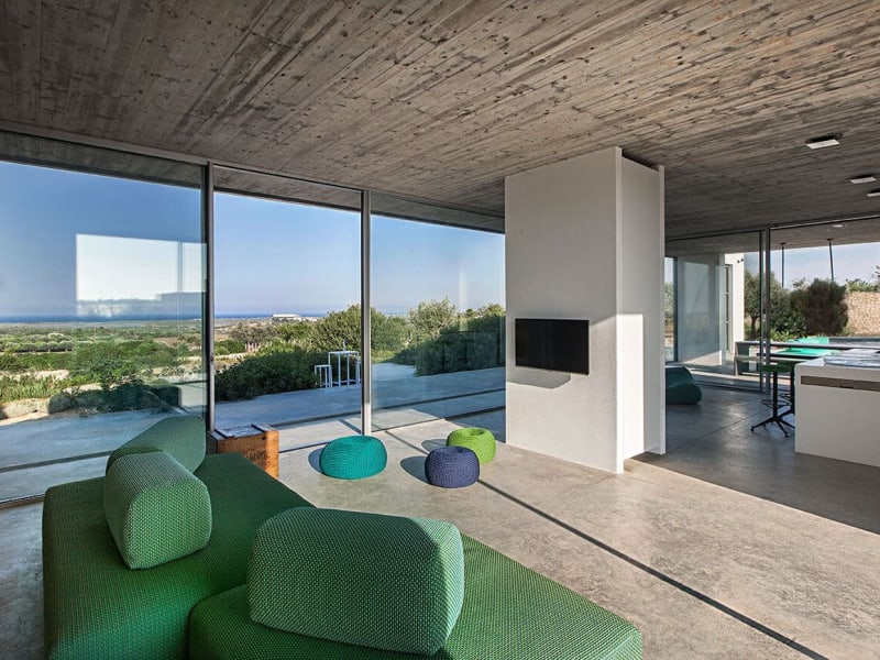 The living area and kitchen looking out to sea and the new pool (an architect's rendering).