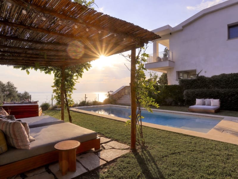 Relaxing in style by the pool.