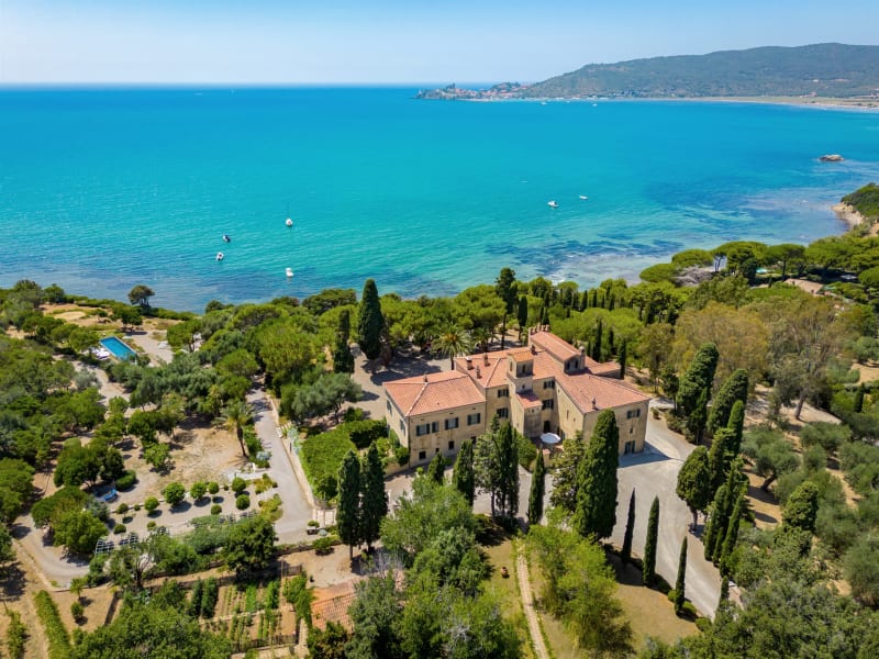 Villa Talamo, its grounds and its views over the bay to the headland of Talamone.