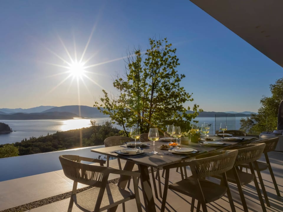 The outdoor dining area boasts incredible views over to the sea.