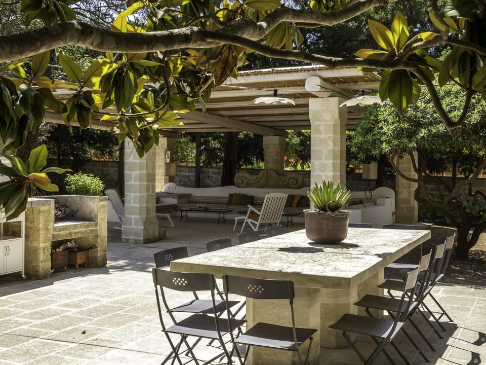 One of the al fresco dining areas is served by a barbecue.