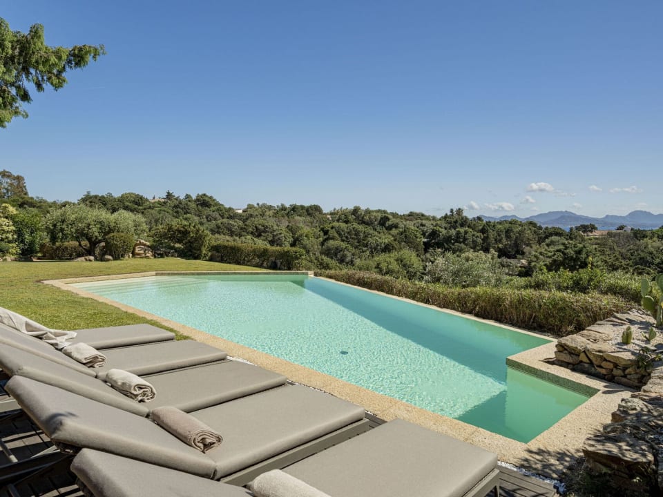 Choose your spot by the pool and settle in for the day.