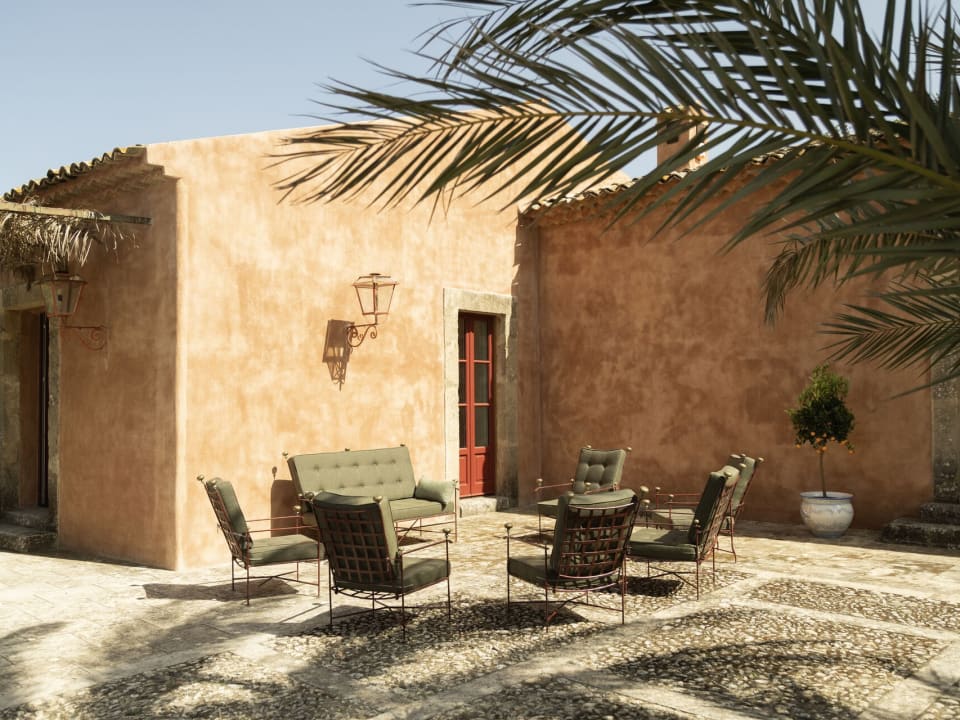 A well-furnished al fresco sitting area on the main terrace.