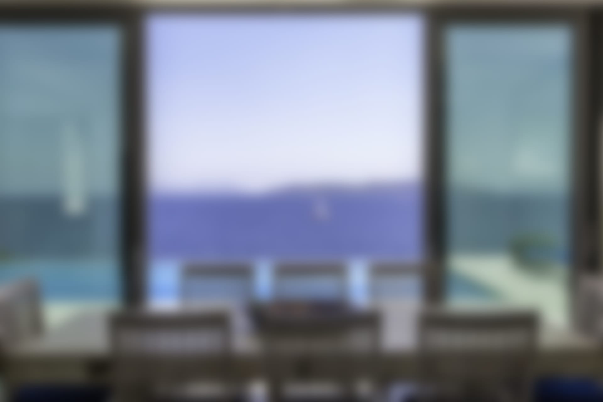 The dining room has sliding glass doors and stunning views.