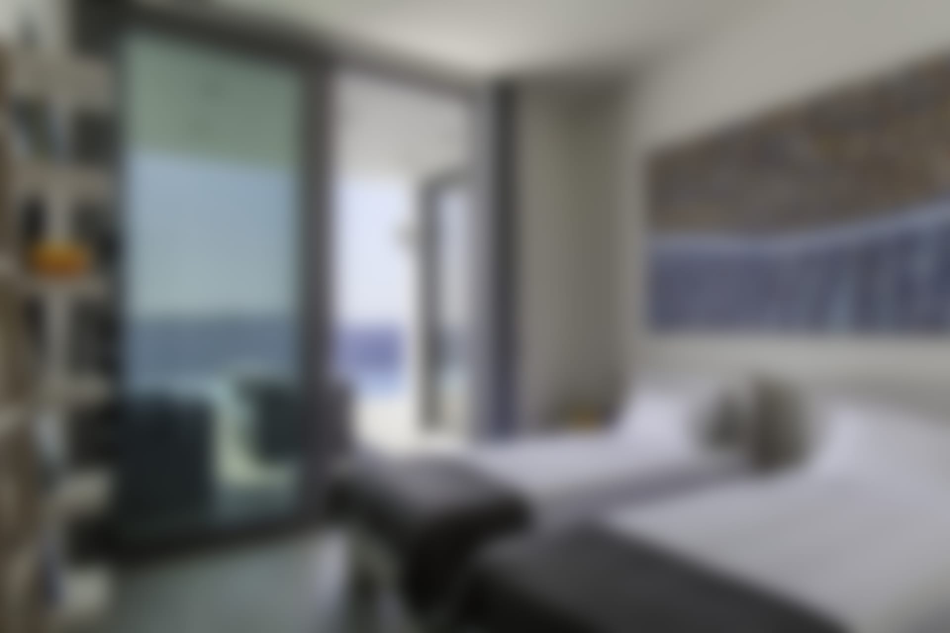 The second double-twin bedroom with its sea and pool views (bedroom 2). 