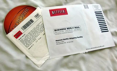 Opened Netflix rental envelope containing a DVD copy of Coach Carter (2005). Photo by BlueMint. Opened Netflix rental envelope containing a DVD copy of Coach Carter (2005). Photo by BlueMint.