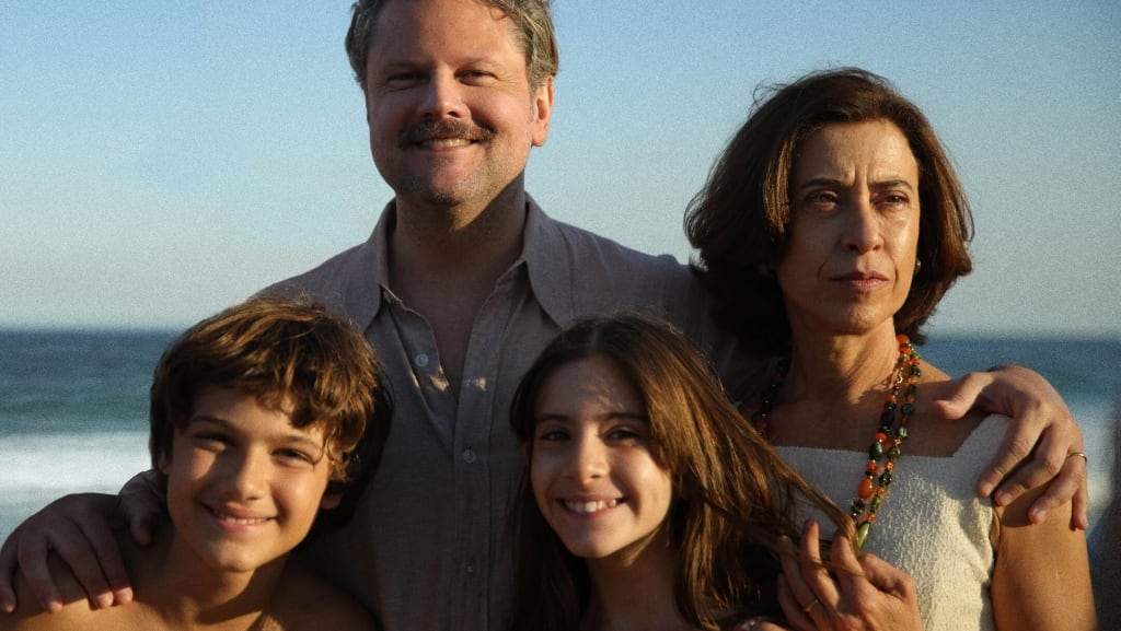 Selton Mello, Fernanda Torres, Cora Mora, and Guilherme Silveira in I'm Still Here. Photo by Sony Pictures Classics.