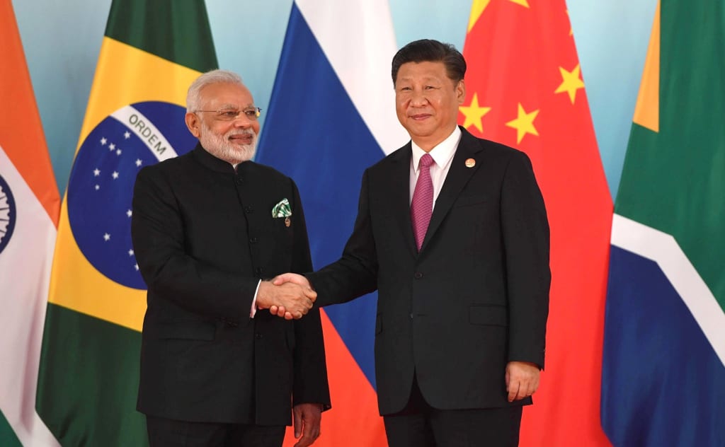 Prime Minister of India Narendra Modi and General Secretary of the Chinese Communist Party Xi Jinping. Photo by The Presidential Press and Information Office of the President of the Russian Federation. Prime Minister of India Narendra Modi and General Secretary of the Chinese Communist Party Xi Jinping. Photo by The Presidential Press and Information Office of the President of the Russian Federation.