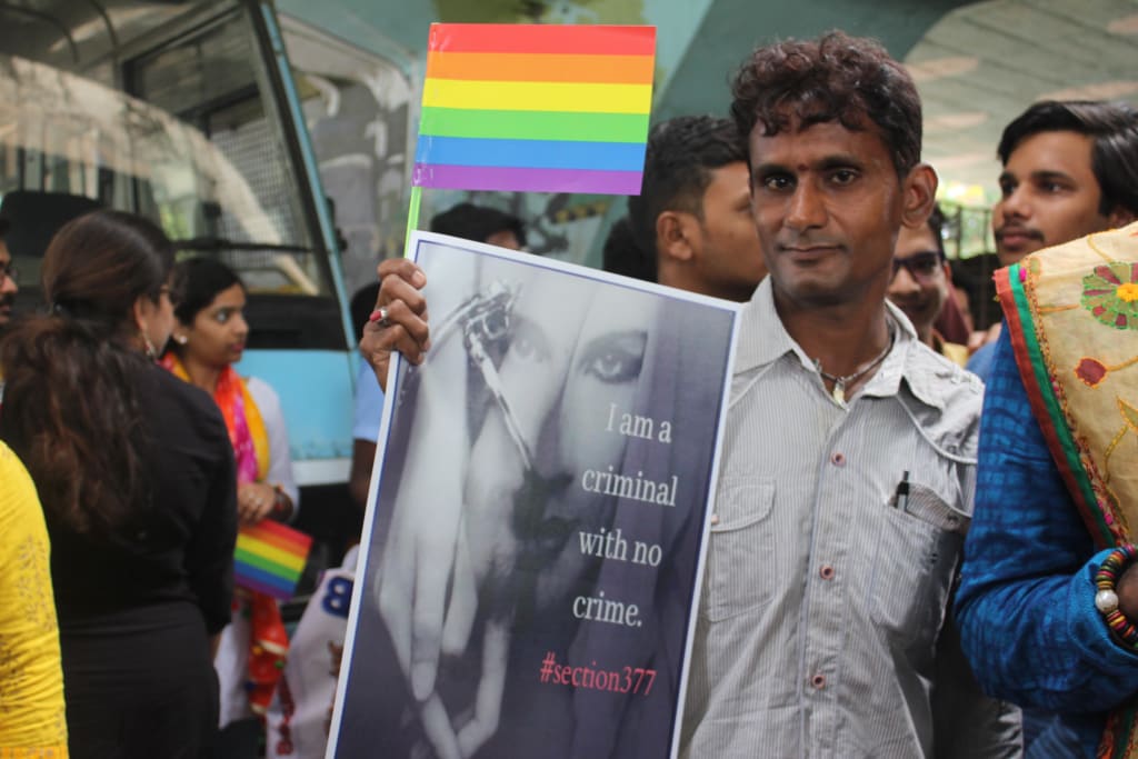 Participant carrying a poster against Section 377 during Bhubaneswar Pride Parade, India. Photo by Sailesh Patnaik. Participant carrying a poster against Section 377 during Bhubaneswar Pride Parade, India. Photo by Sailesh Patnaik.
