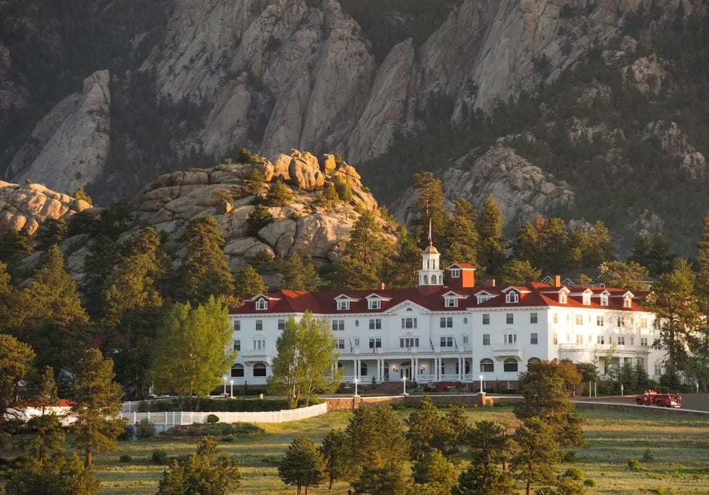 The Stanley Hotel in Estes Park, Colorado, known for its historic luxury and haunting lore, nestled in the Rocky Mountains. Photo by The Stanley Hotel. The Stanley Hotel in Estes Park, Colorado, known for its historic luxury and haunting lore, nestled in the Rocky Mountains. Photo by The Stanley Hotel.