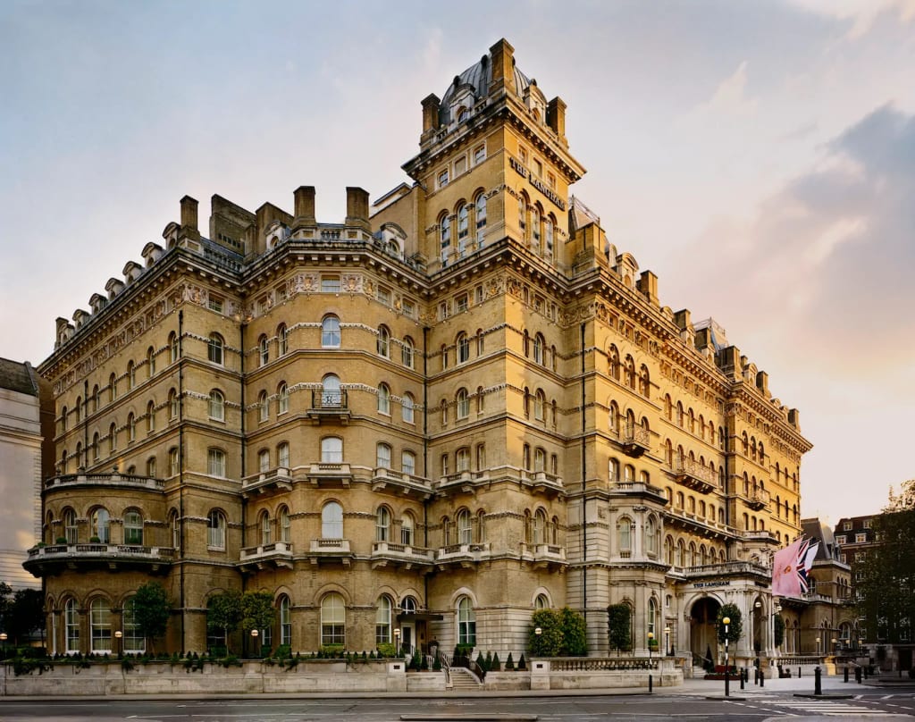 Exterior view of the historic Langham Hotel in London showcasing its classic architecture, a key luxury accommodation with reputed haunted history. Photo by The Langham Hotel. Exterior view of the historic Langham Hotel in London showcasing its classic architecture, a key luxury accommodation with reputed haunted history. Photo by The Langham Hotel.