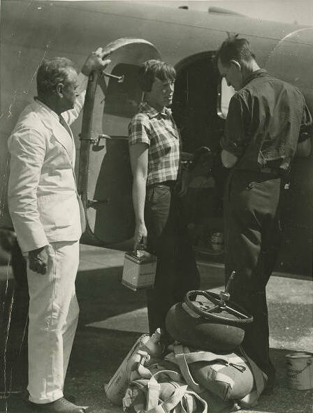 Noonan and Earhart prepare for the flight to Lae at Port Darwin, Australia on June 28, 1937. Public domain. Noonan and Earhart prepare for the flight to Lae at Port Darwin, Australia on June 28, 1937. Public domain.