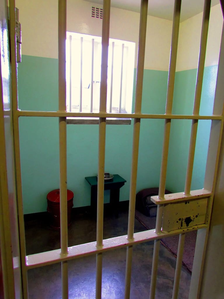 Nelson Mandela's prison cell on Robben Island, where he was held for 18 years during apartheid. Photo by Schavda. Nelson Mandela's prison cell on Robben Island, where he was held for 18 years during apartheid. Photo by Schavda.