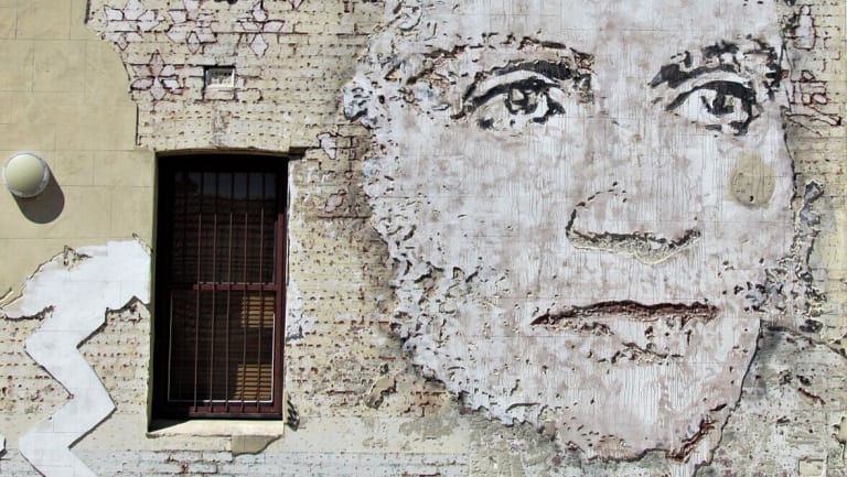 Norfolk Hotel Artwork Fremantle 2013 Street Arts Festival. This is not a painting. It is chisselled into the wall in what the artist Vhils calls a wall sculpture. Photo by Meru Fumoto.