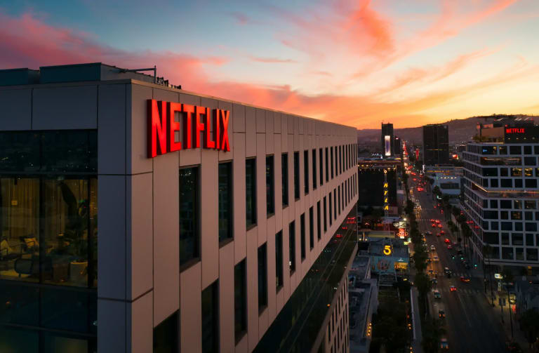 The Netflix empire: How a simple late fee sparked the streaming revolution that changed entertainment forever. Photo by Venti Views. The Netflix empire: How a simple late fee sparked the streaming revolution that changed entertainment forever. Photo by Venti Views.