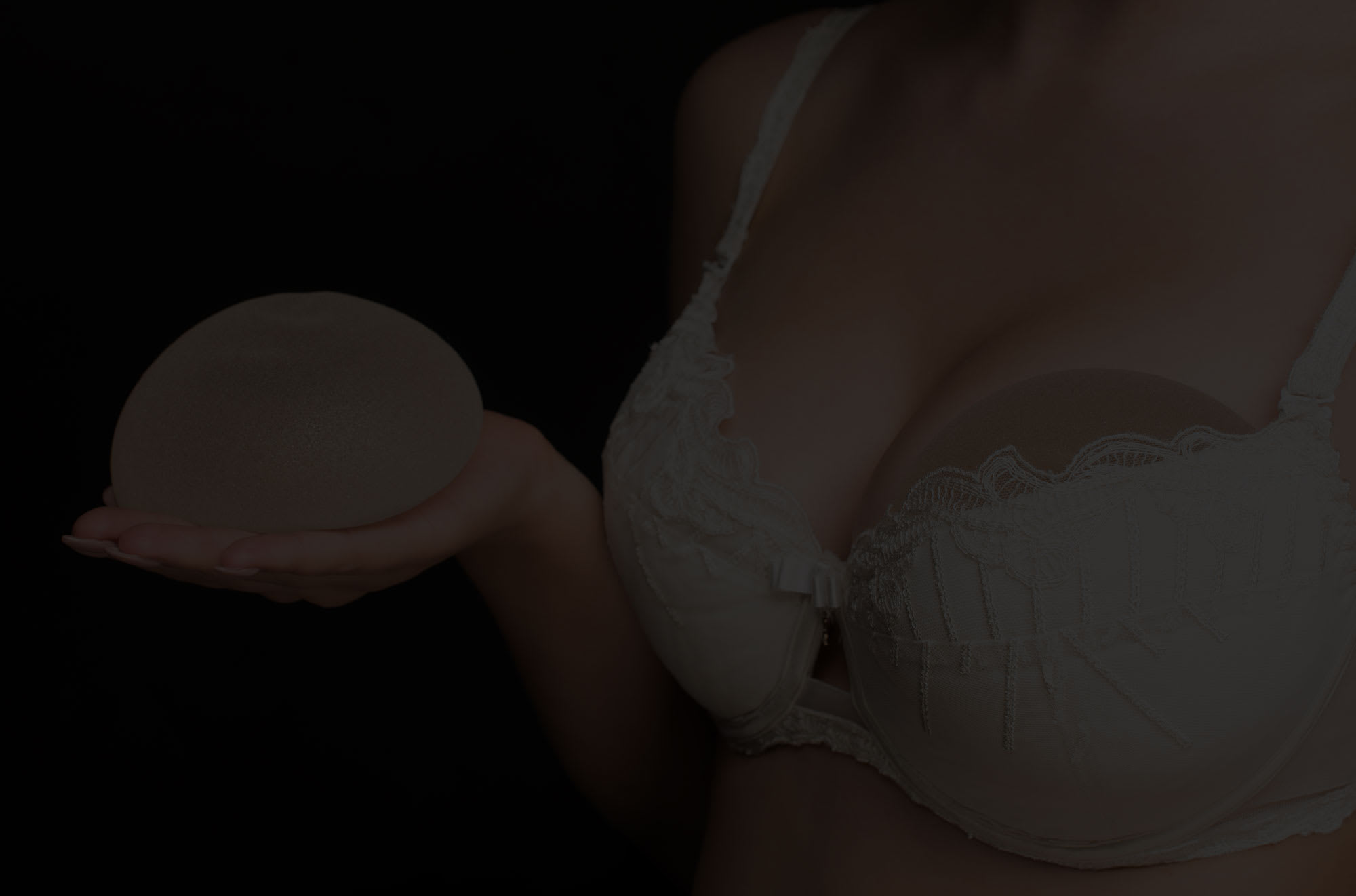 Beautiful woman with large breasts after fat transfer breast augmentation.