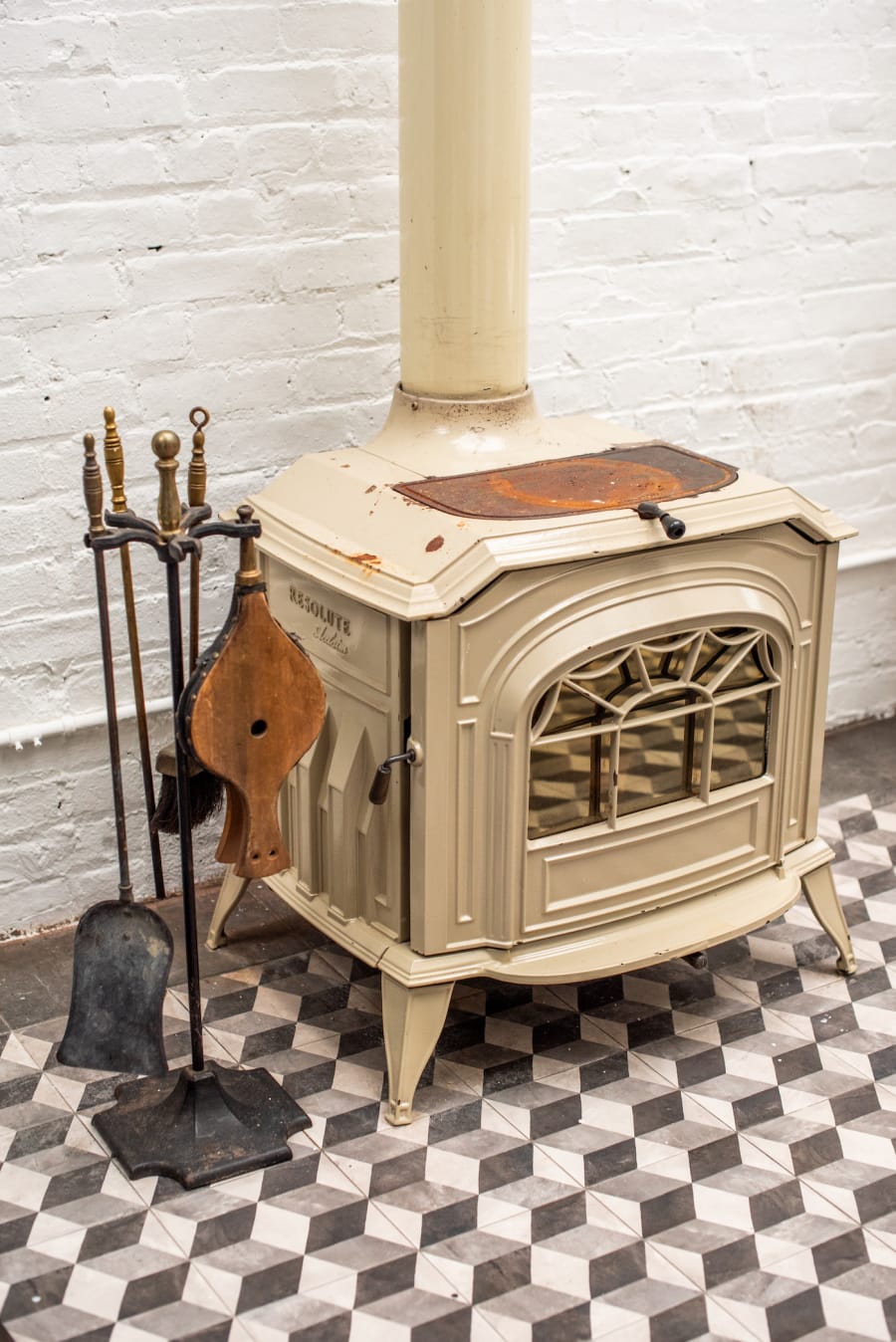 The wood-burning stove and original fire doors