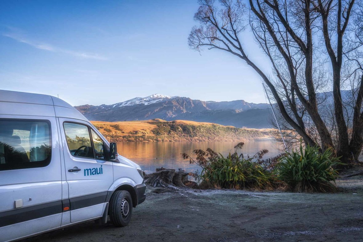 maui campervan parked up by snowy mountains -scenic