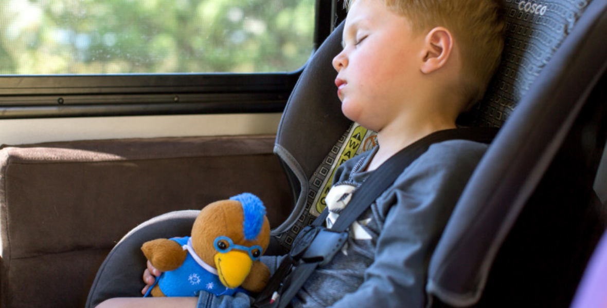 Toddler sleeping in Campervan