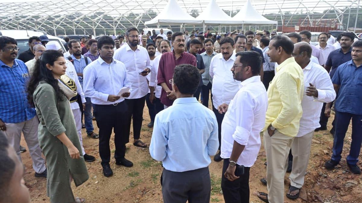 Collector inspects AU grounds ahead of house pattas distribution event