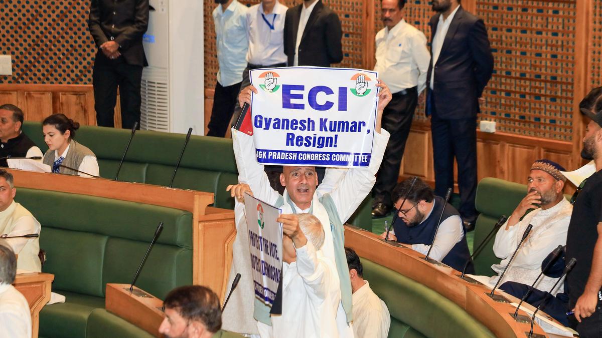 Congress legislators flash banners demanding CEC Gyanesh Kumar’s resignation inside Jammu and Kashmir assembly