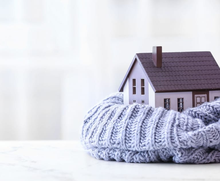 Home heating tips home wrapped in a sweater