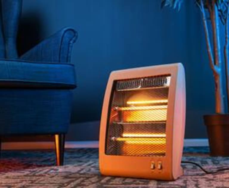 Space heater near a chair in a home