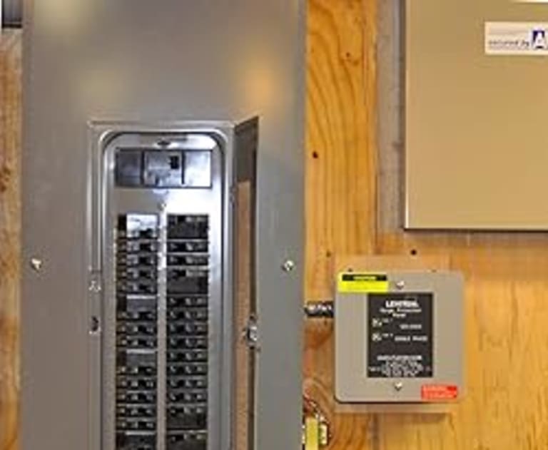 Surge protector and circuit breaker box in a home